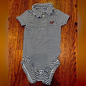 Vineyard Vines American flag navy blue striped onesie.